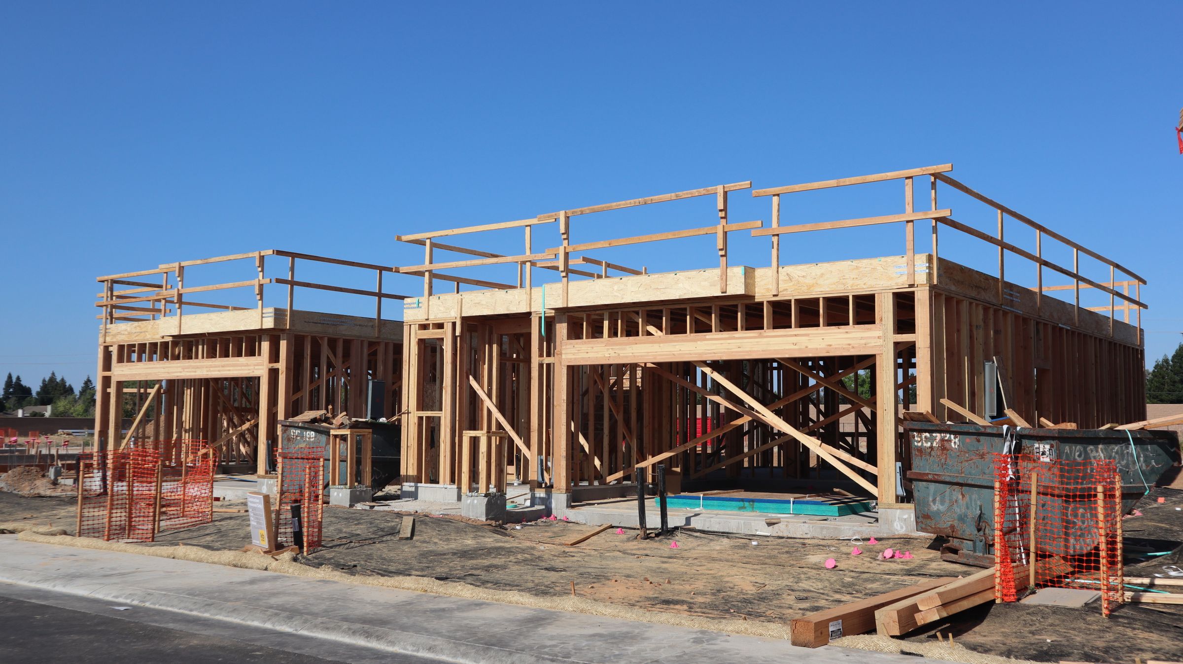 Large residential building taking shape in wood framing