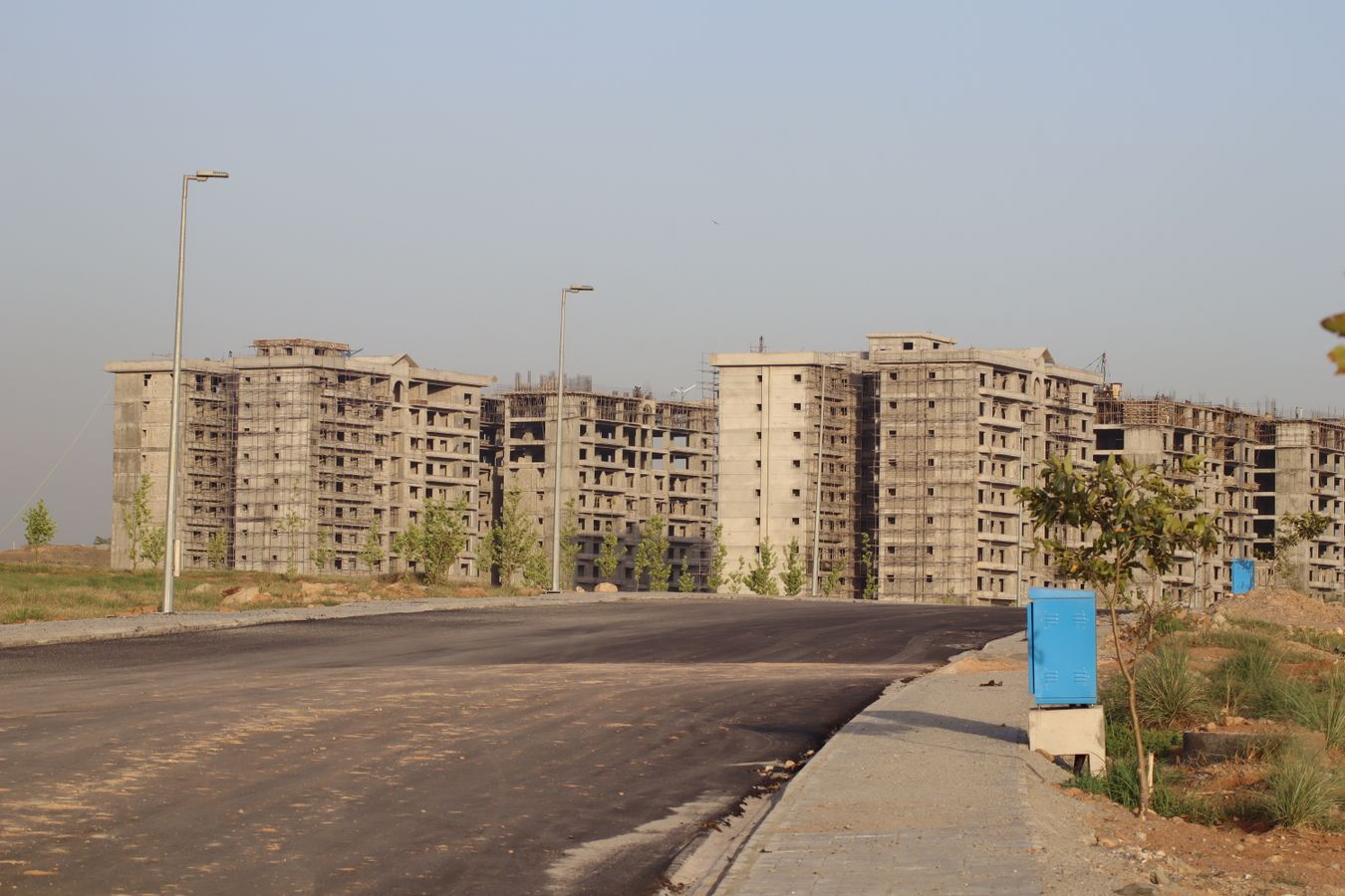 Multiple apartment buildings progressing through active construction