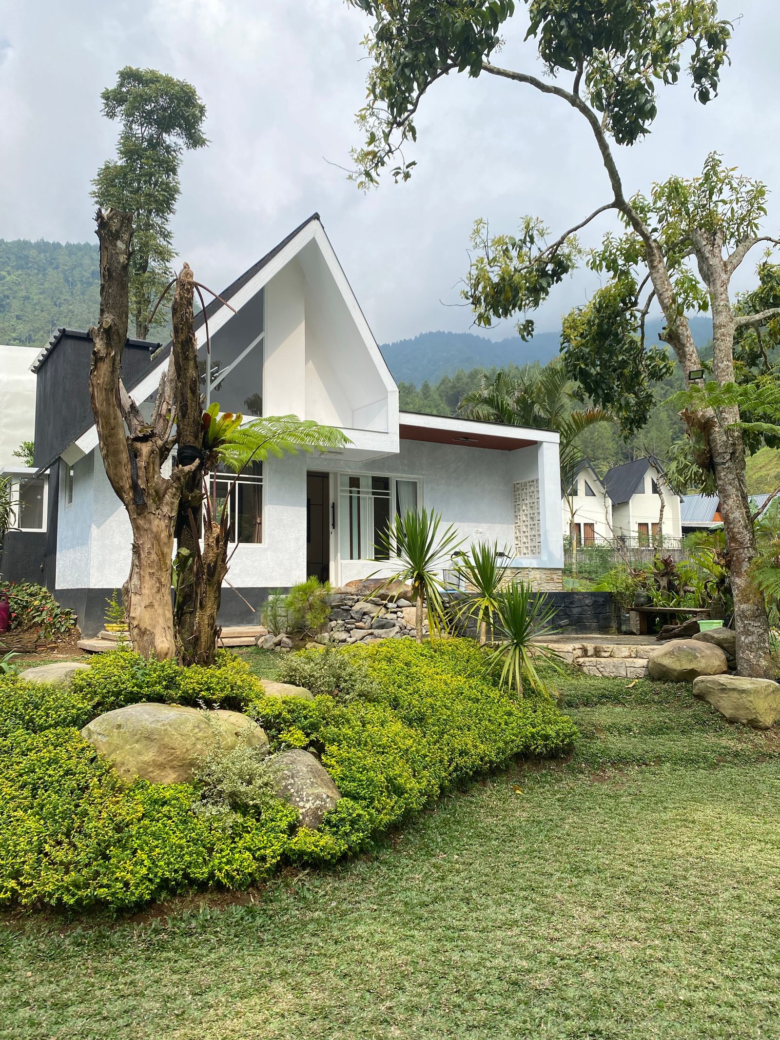 Completed modern home in a mountain landscape